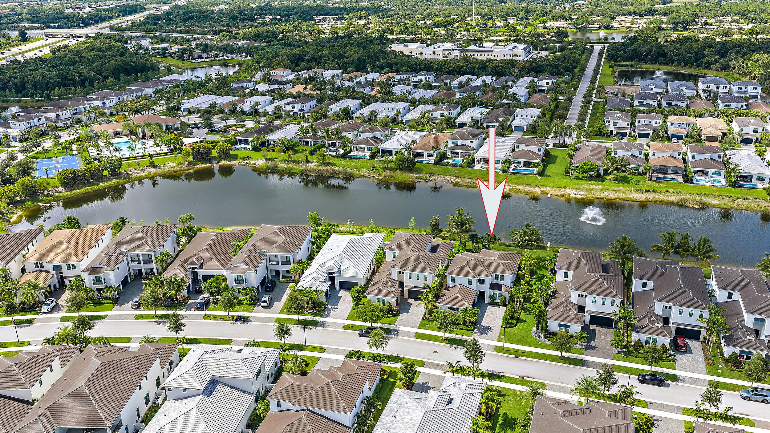 Perfectly situated in the center of Artistry, this home offers a peaceful water view and desirable southern exposure, filling the interior with natural light throughout the day.