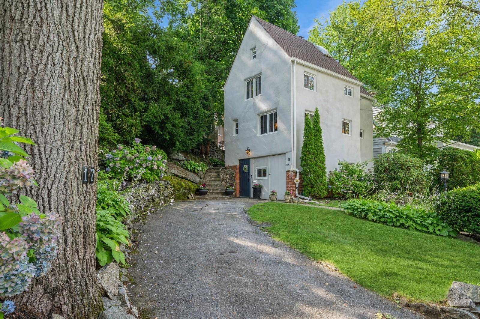 This wonderful 1929 Tudor is situated on a quiet tree lined street.