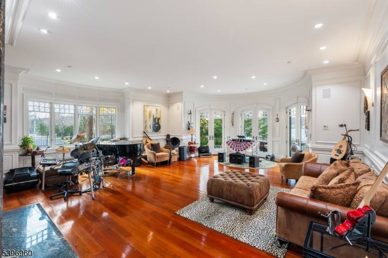 Experience resort style living on Lake Hopatcong with approximately 15, 000 sq ft of masterfully crafted interiors and 200 ft of pristine lake frontage.