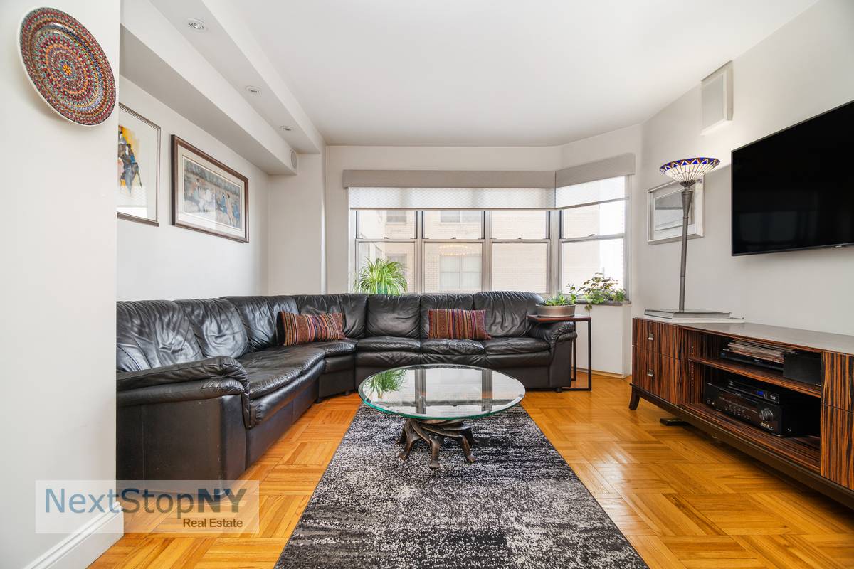 Exquisitely renovated spacious apartment with city views.