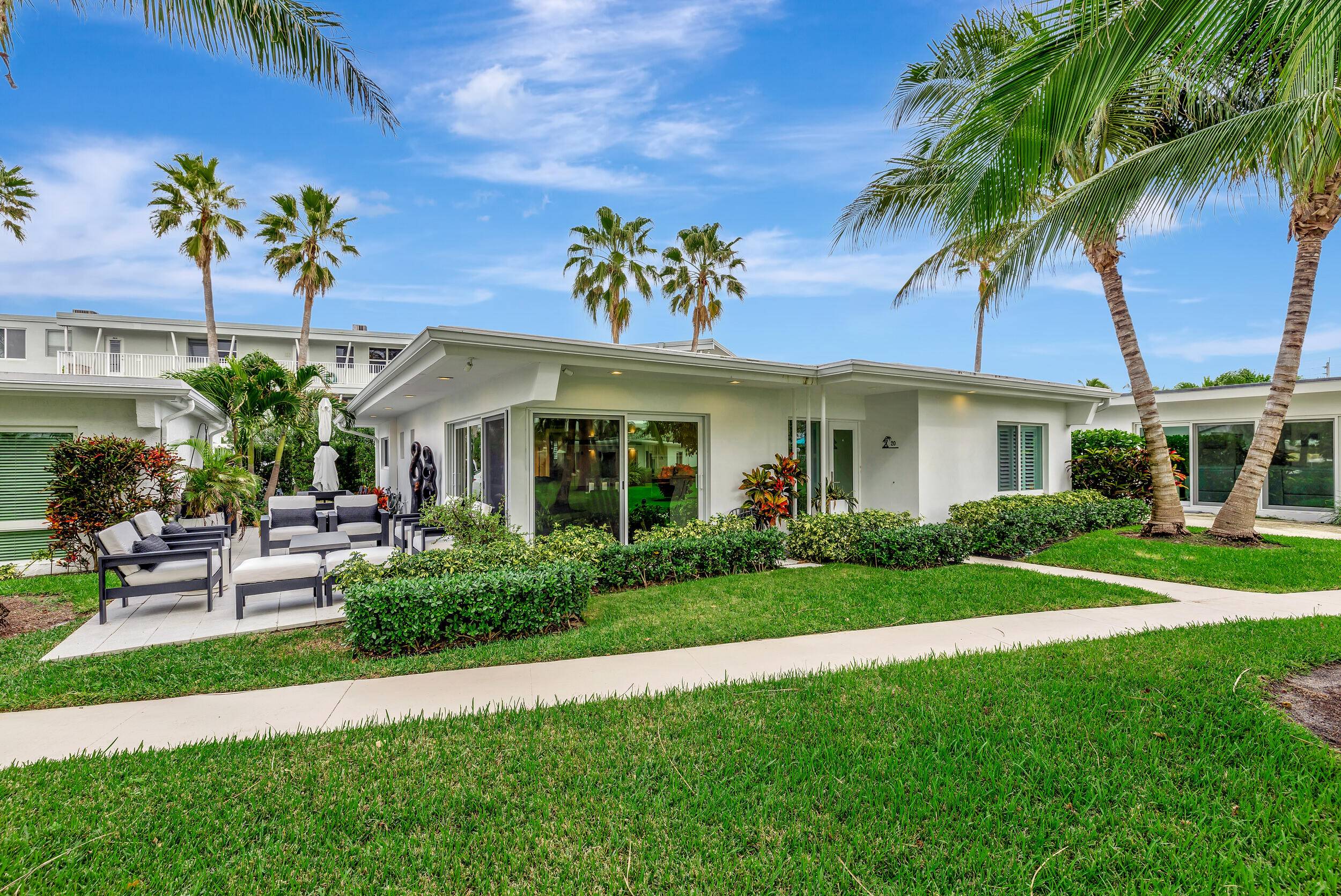 BETTER THAN A CONDO.... Experience coastal living like never before in this stunning 3 bedroom, 2 bath mid century modern villa on Hillsboro Mile.