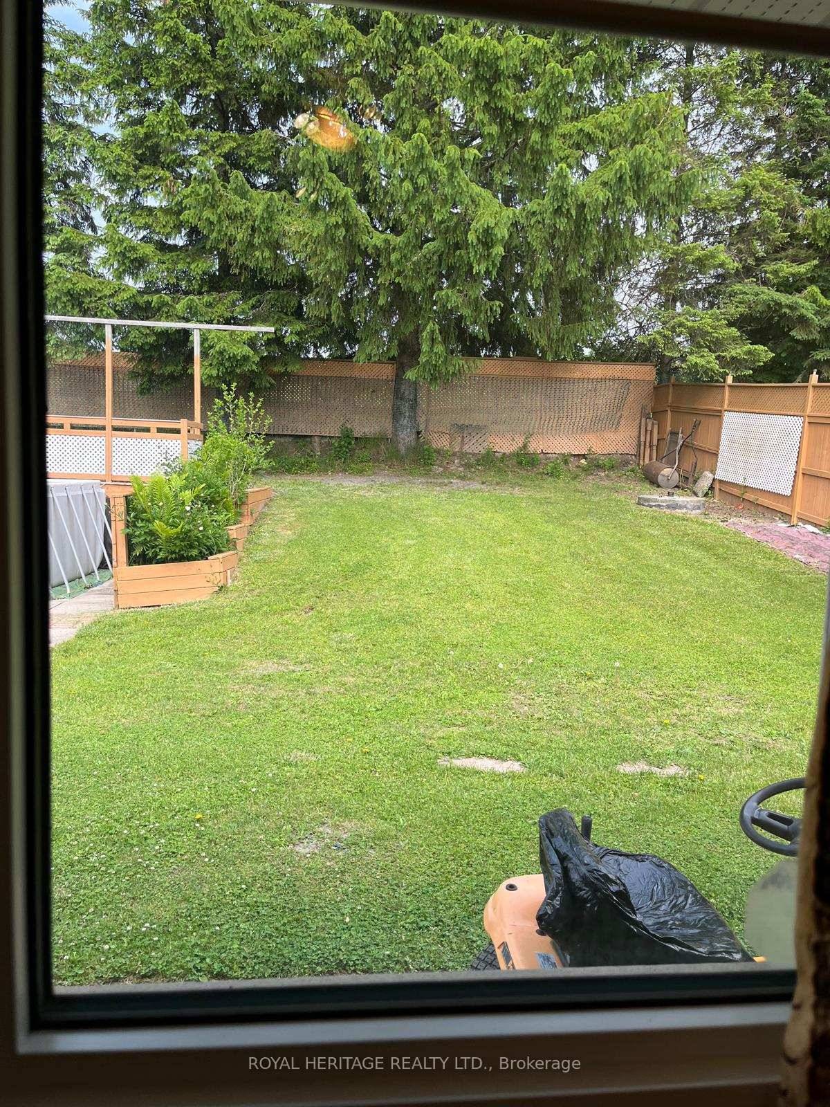 REMODELLED custom Built all Brick Bungalow with attractive curb appeal nestled on a corner lot mostly cleared with a gorgeous garden and some treed area.