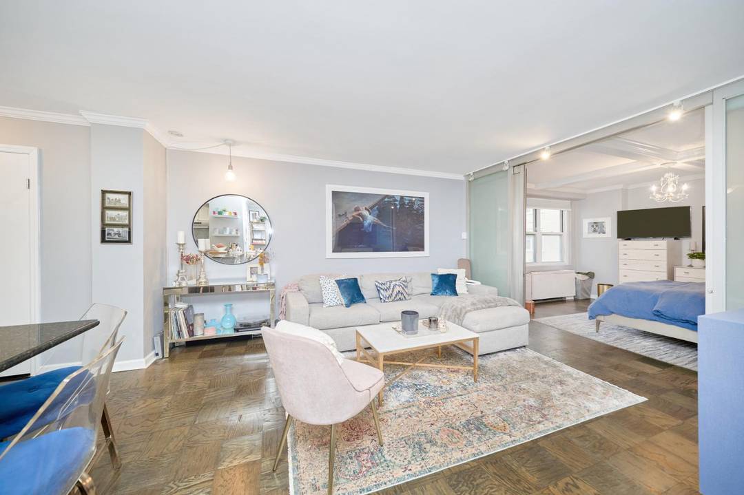 Oversized Alcove Studio Renovated New York TowersRESIDENCE Sunny, Renovated Alcove StudioGlass Doors Create Separation Between Sleeping amp ; Living AreaKing Sized Bed w Ample Space for Additional Furniture.