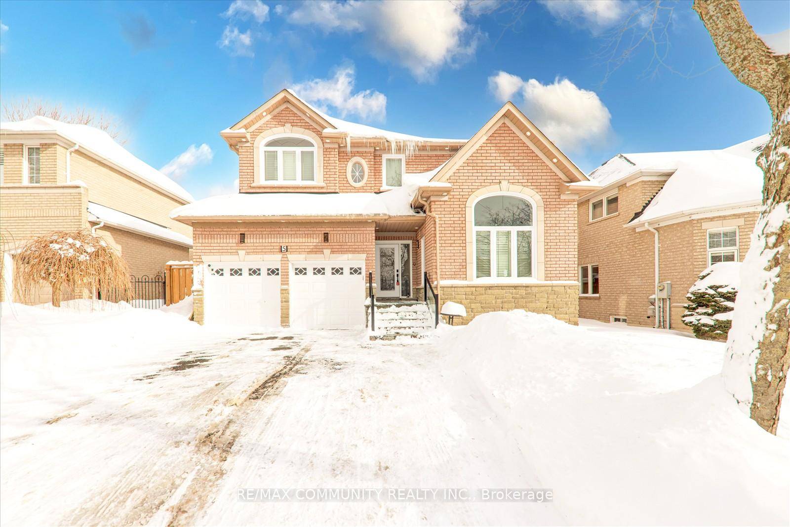 Nestled on a serene street with a stunning backdrop of lush woods, this home boasts one of the largest frontages in the area, offering unparalleled privacy and space.
