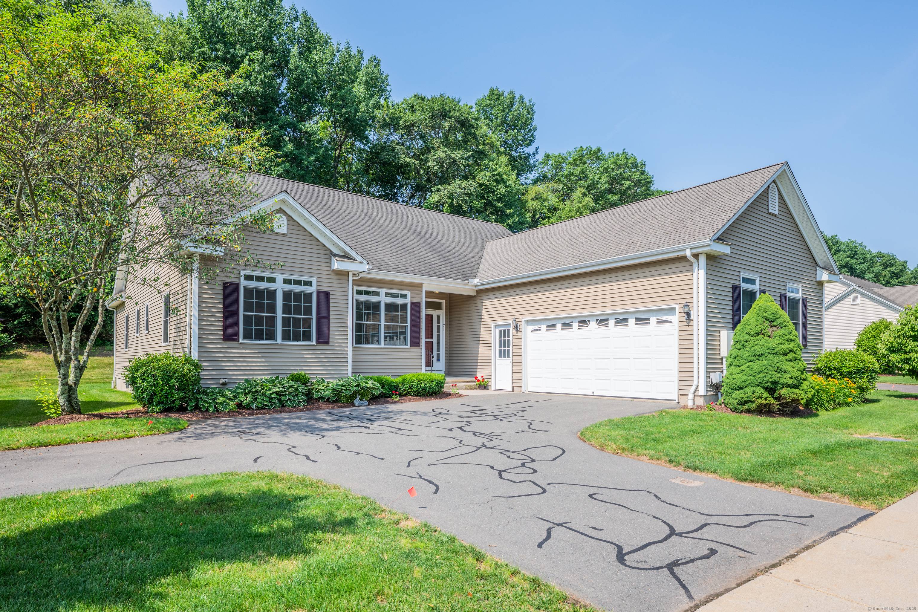 Enjoy the ease of single level living in this beautiful free standing ranch style home, nestled in one of the area's most sought after 55 communities.