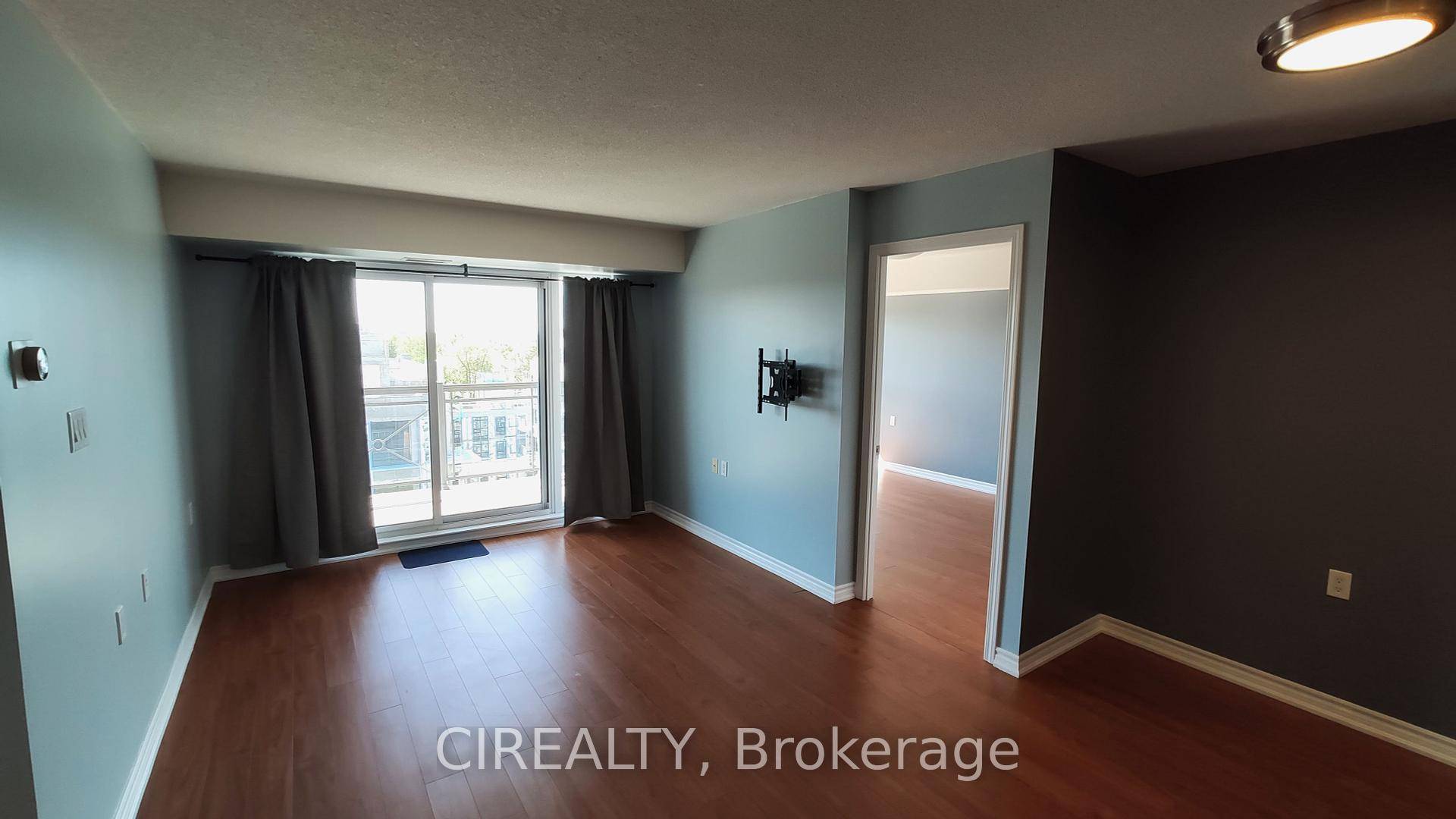Sun splashed, south facing suite with balcony access from every room and an unobstructed city vista.