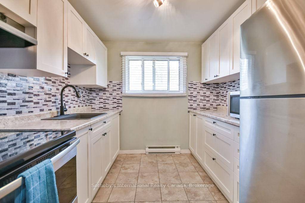 This open concept town home is ideal for first time home buyers, investors or that busy professional who needs close and easy access to the highway.