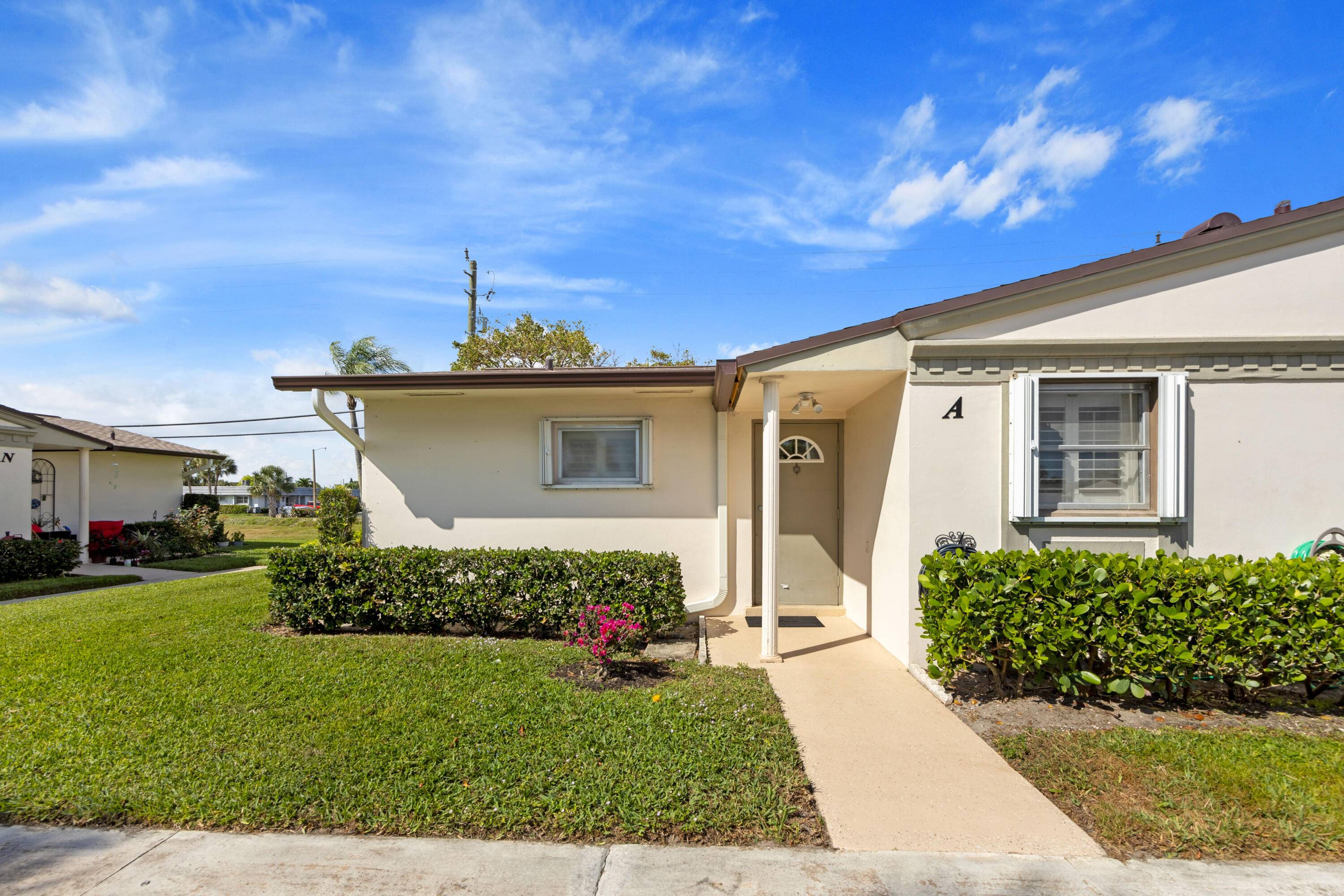 Pristine villa with 1 bedroom 1 full bathroom and 1 half bath.