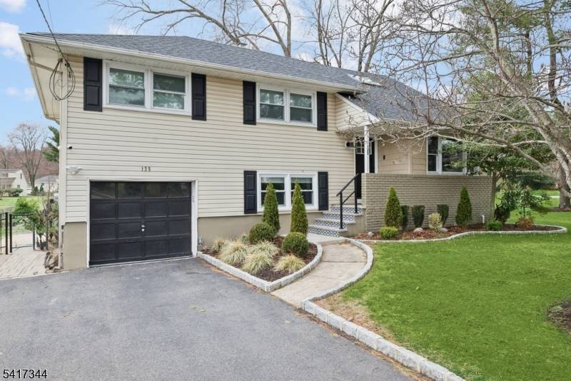 Beautiful and completely renovated Split Level Home just waiting for you to move in and enjoy !