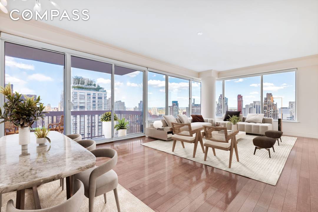 Welcome to 200 East 69th Street 29B, an expansive corner three bedroom, three bathroom residence perched high above the Upper East Side, offering sweeping panoramic views and refined modern living ...
