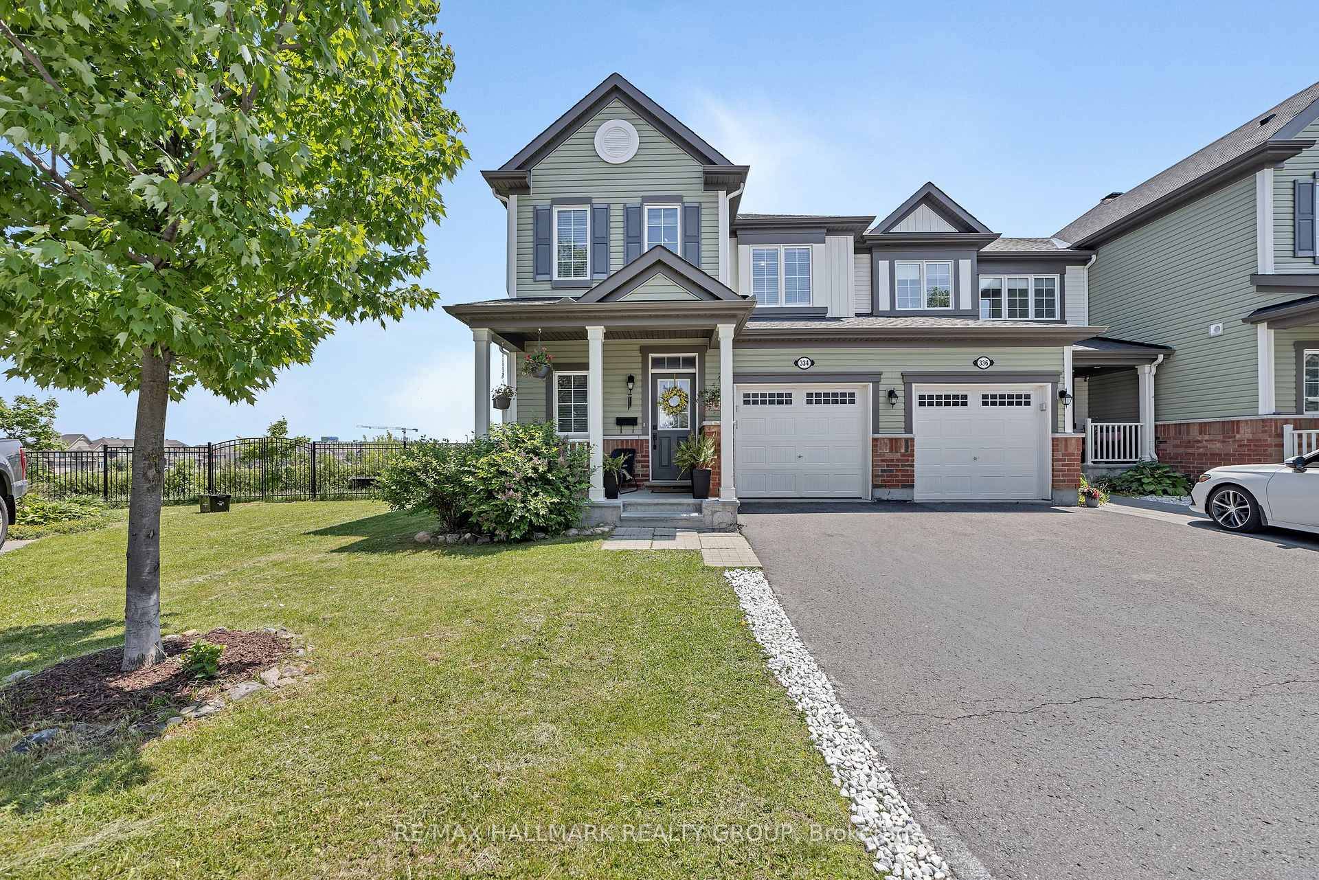Beautiful, modern and spacious Fernwater end unit with no rear neighbours on a quiet crescent in the family oriented neighbourhood of Fairwinds.