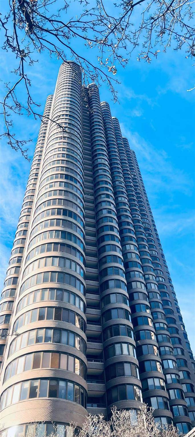 53rd floor high level residence offering rare height and unobstructed panoramic views, 2 bedroom, 2 bathroom layout with a separate kitchen, dining area, and scenic living room, River views combined ...