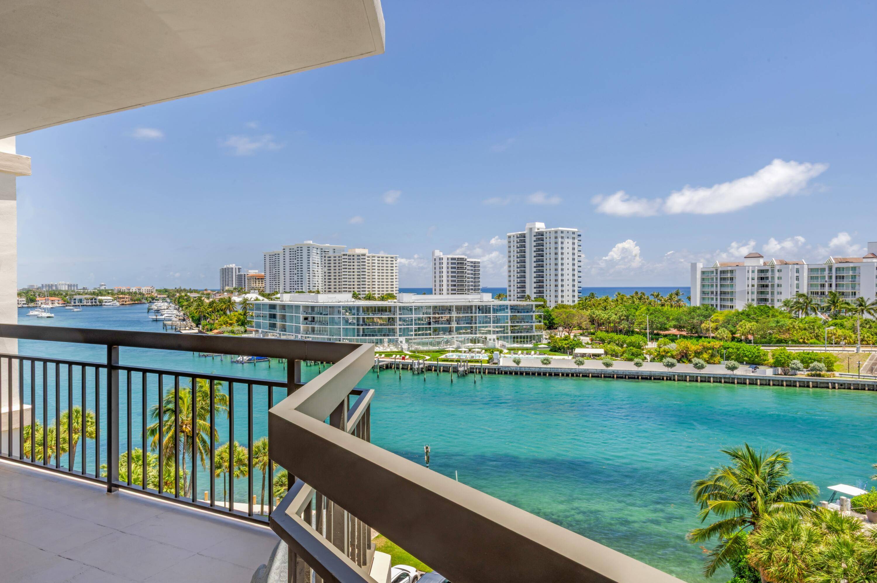 BEAUTIFULLY REMODELED CORNER RESIDENCE WITH INTRACOASTAL, OCEAN AND INLET VIEWS FROM A WRAPAROUND TERRACE ON LAKE BOCA !