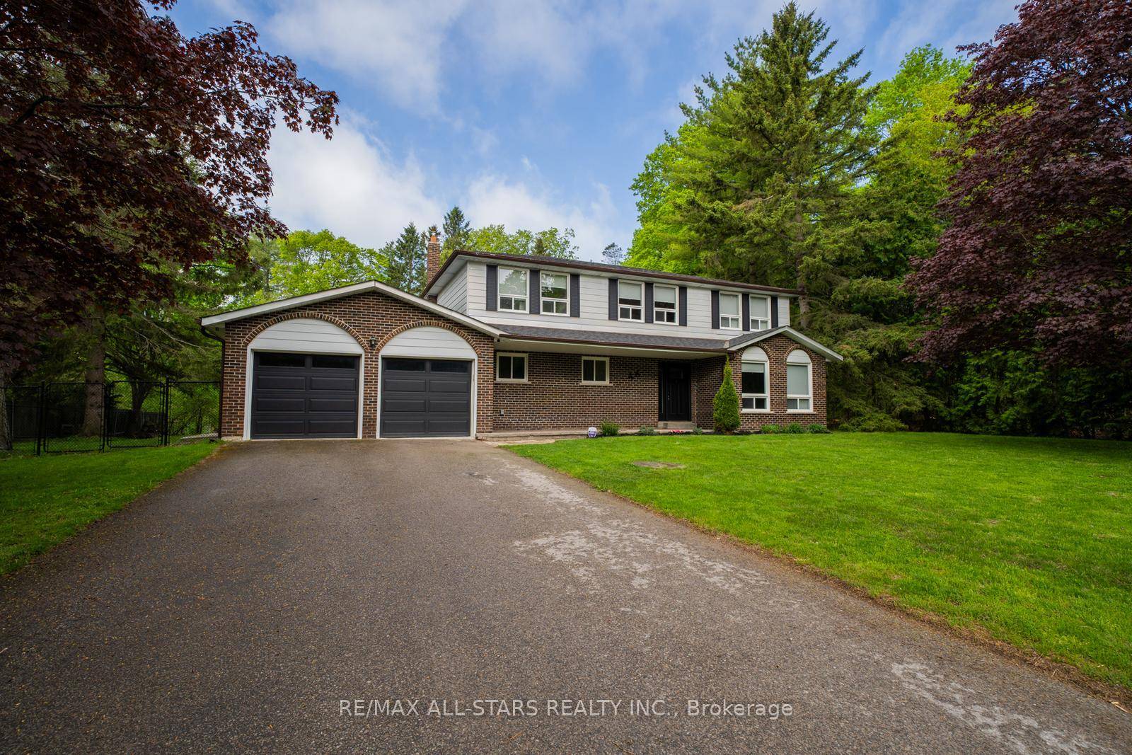 A truly exceptional gem nestled on a serene half acre lot, backing onto lush trees and picturesque trails.