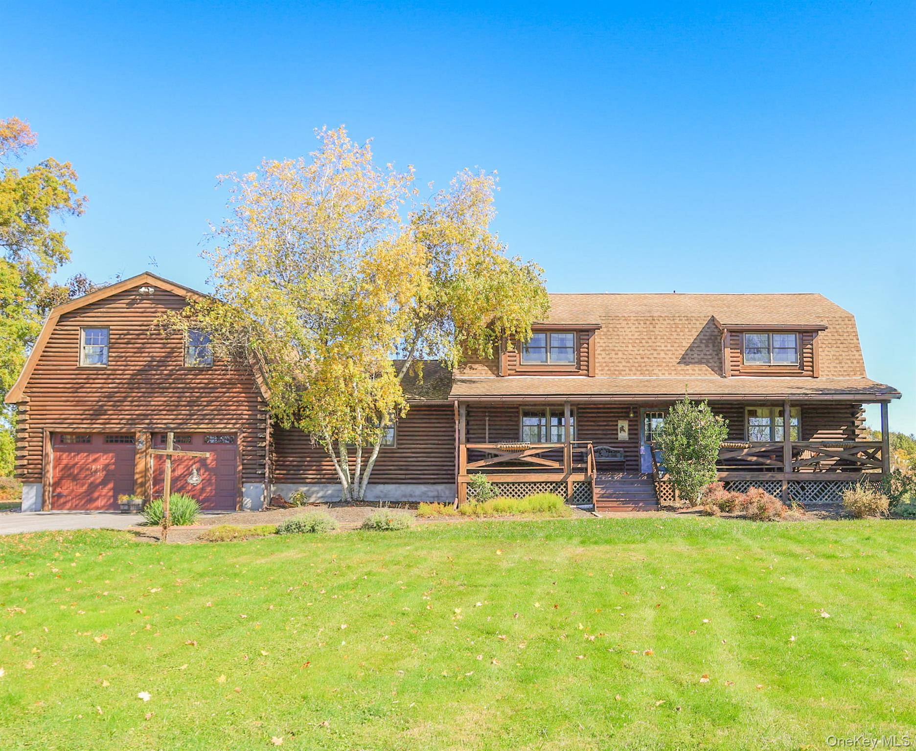 Welcome to 618 Clapp Hill Road in Lagrangeville a one of a kind log cabin retreat blending rustic charm with spacious, modern living.