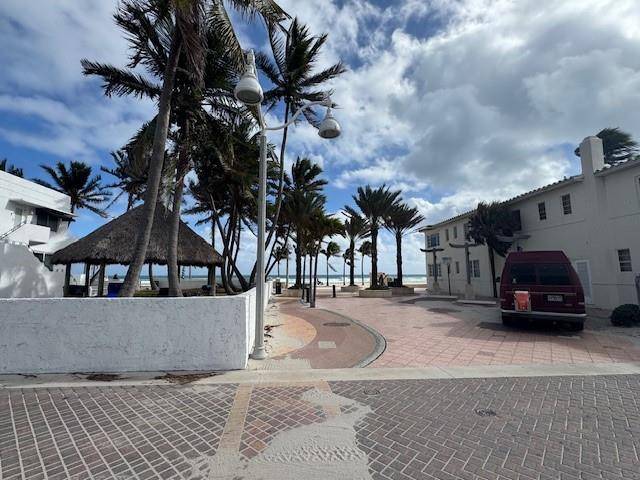 AMAZING CORNER PROPERTY 80 FEET FROM THE BEACH, GREAT OCEAN VIEW, 4 LOTS, WITH PARKING, BEAUTIFUL 11 UNITS, GREAT MIX OF UNITS, RETURN CUSTOMERS, SO MANY THINGS CAN BE DONE ...