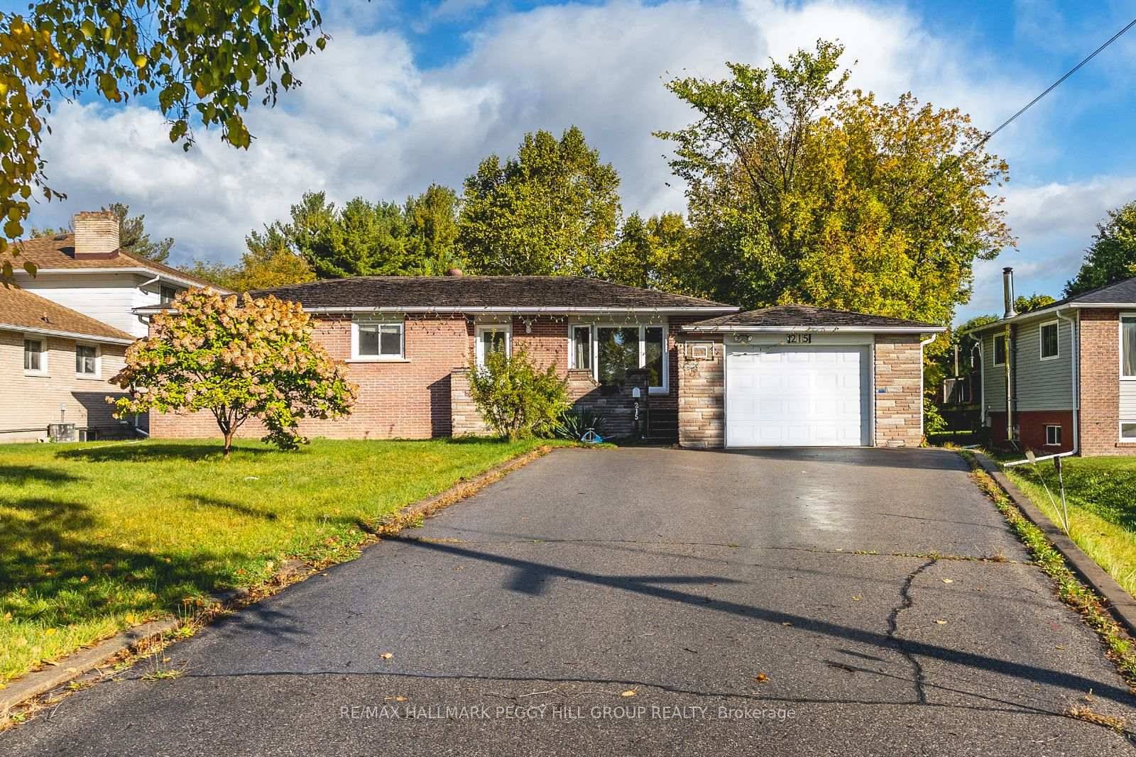 WELL KEPT BUNGALOW ON OVER HALF AN ACRE PRIME DEVELOPMENT OPPORTUNITY NEAR ALL AMENITIES !