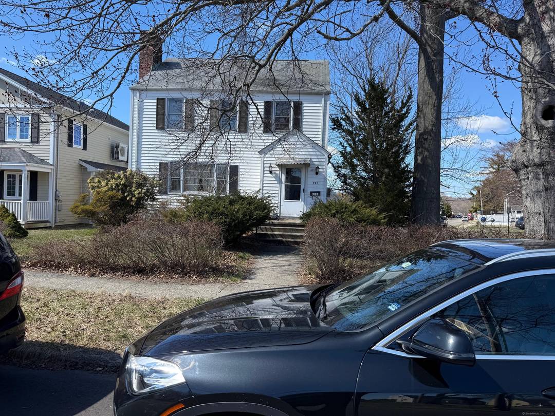 Come see this spacious Colonial situated on a corner lot with two car detached garage.