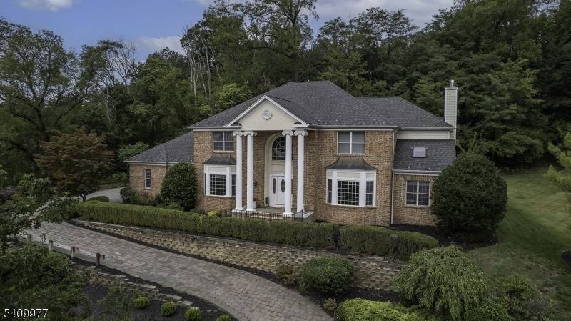 Set on a tree lined street in the highly sought after Montville Acres, this impressive and immaculate 5 bedroom, 4.