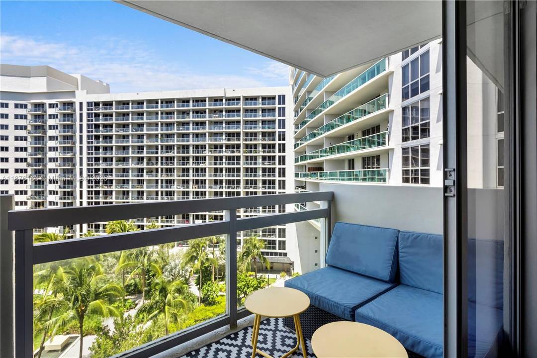 This large one bedroom unit with a walk in closet features a balcony overlooking the flamingo garden and offering incredible bay views.