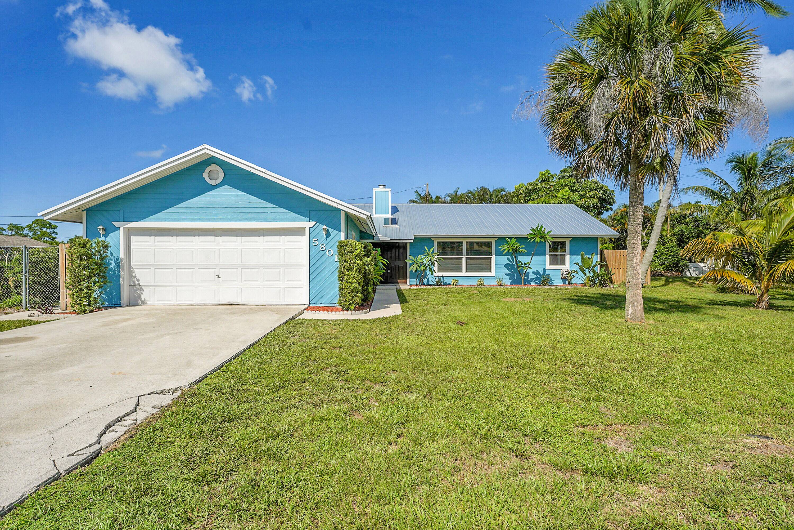 Welcome home to a spacious 5 bedroom, 2 bathroom ranch style home situated on a large 0.