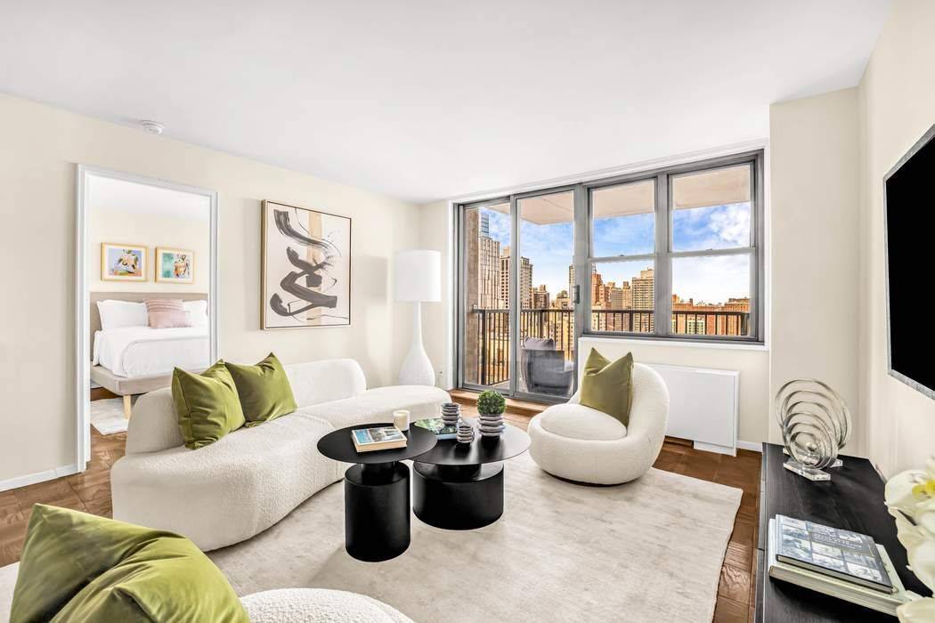 Experience refined living in this sun splashed 22nd floor corner home.