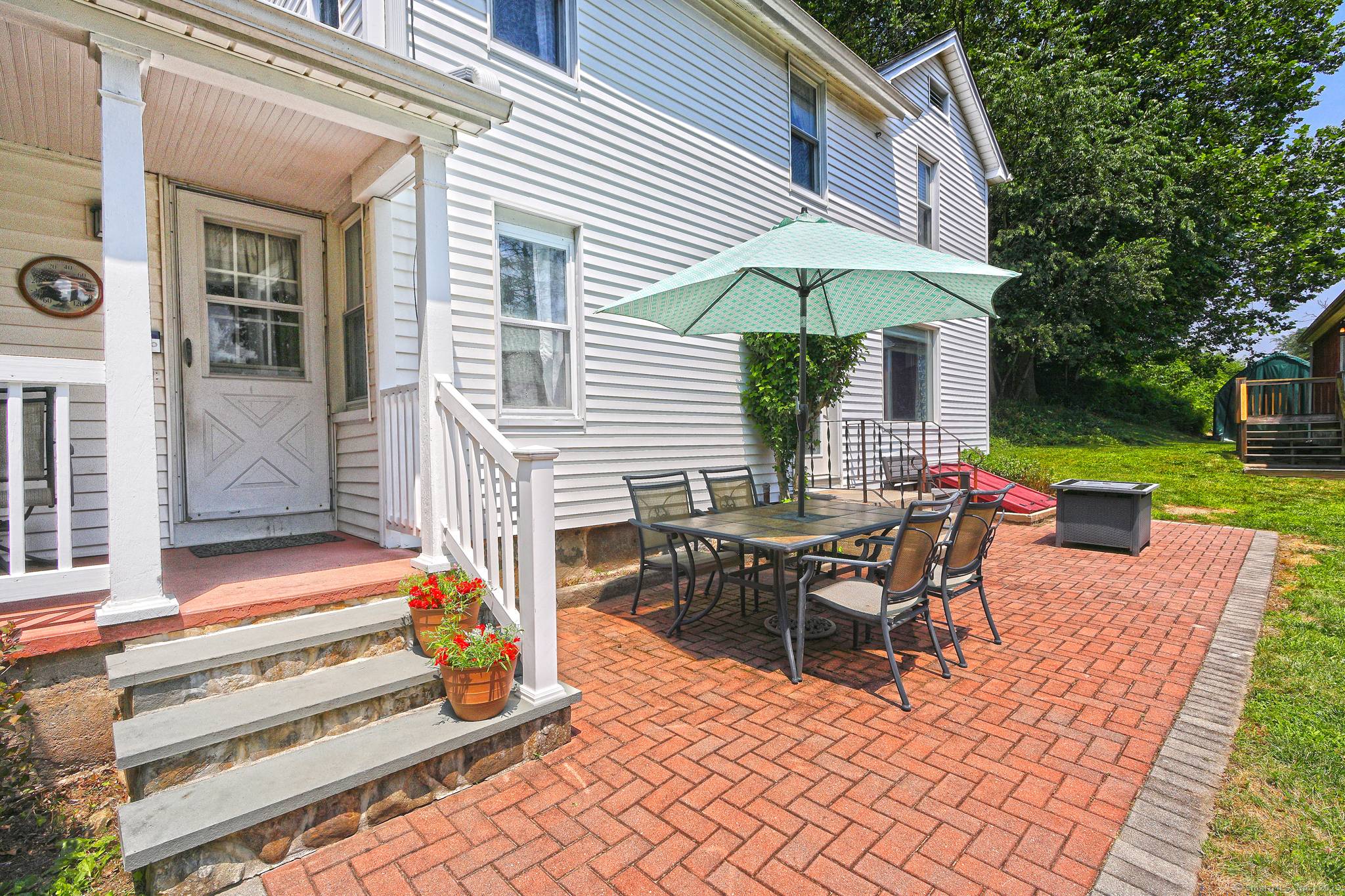 Full of charm and character, this beautifully remodeled country colonial features hardwood floors throughout and a cozy fireplace with a pellet insert.