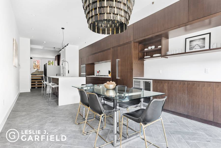 Truly Spectacular and one of a kind a 25' wide home with private parking and a 22' long indoor pool.