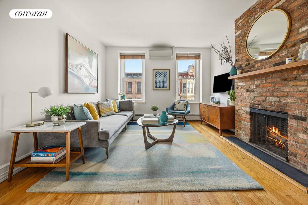 This bright, top floor two bedroom apartment offers classic prewar character in a pet friendly, 8 unit co op.