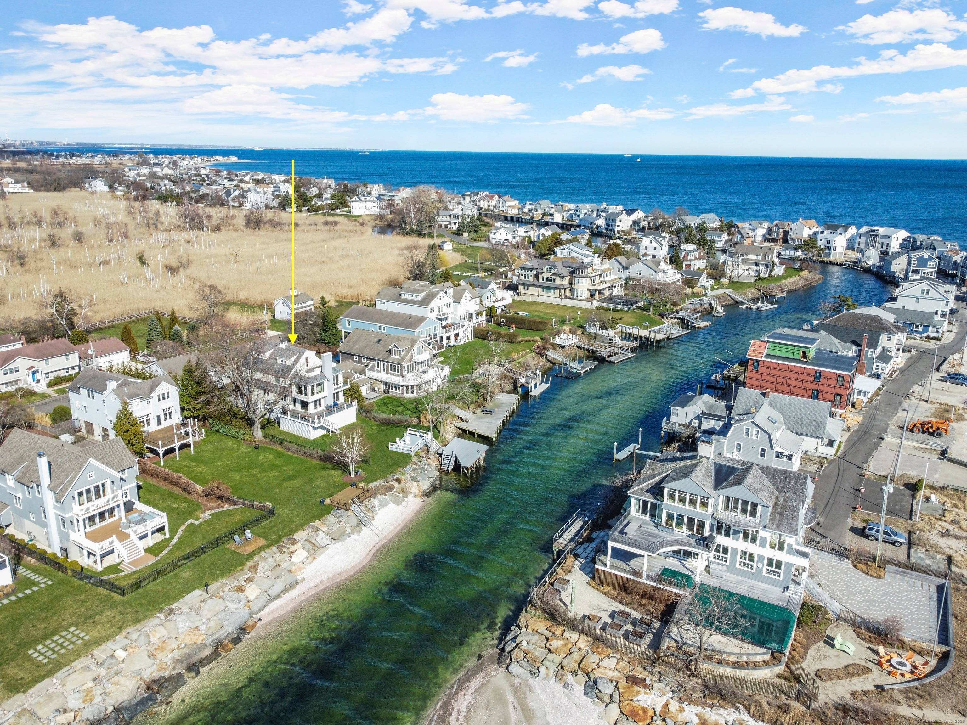 Welcome to a truly exceptional opportunity a direct waterfront compound offering expansive views of Long Island Sound, a dock, endless showstopping sunsets.