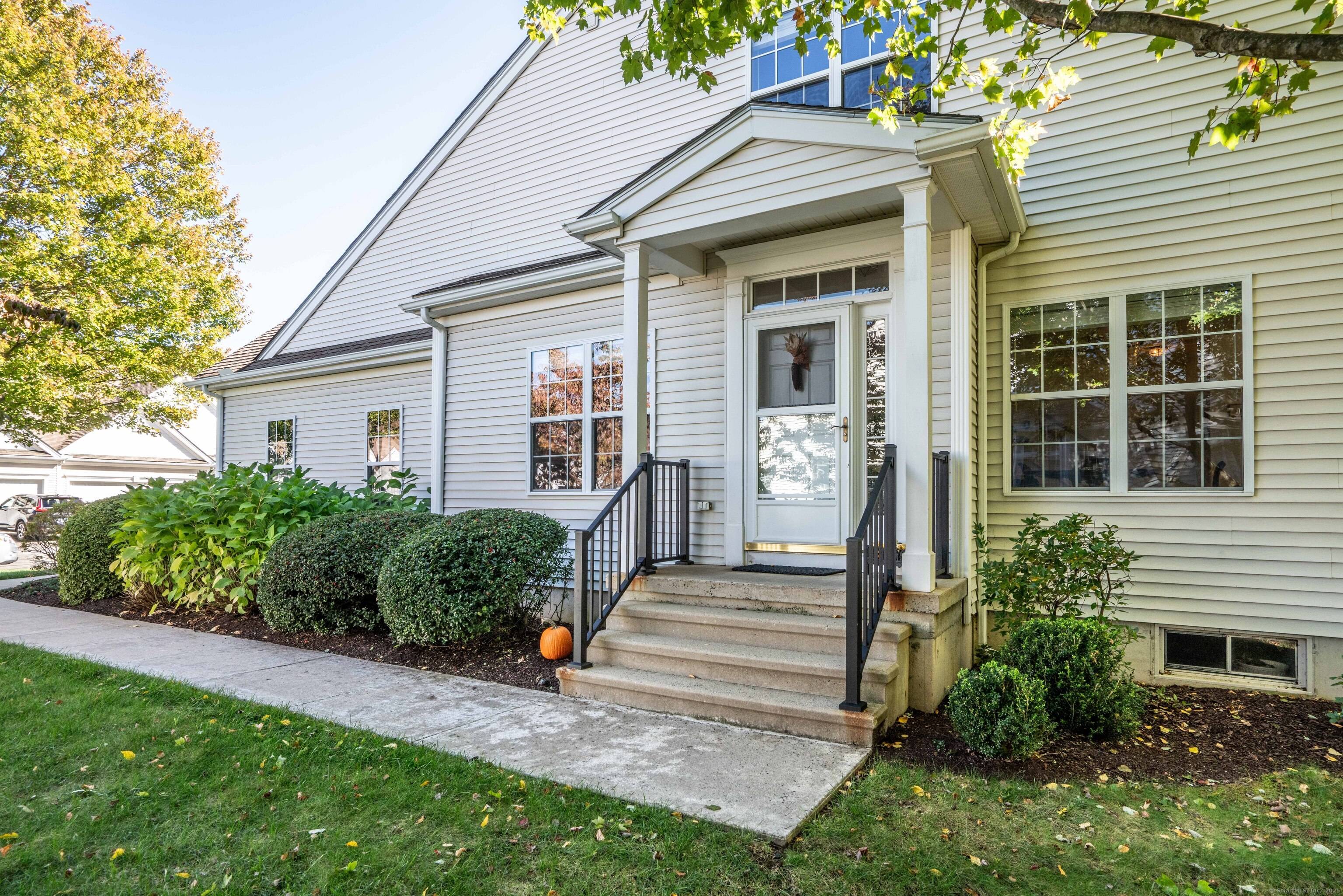 Discover the exceptional opportunity to own this meticulously maintained end unit condo in the highly sought after Oxbow Ridge 55 community.