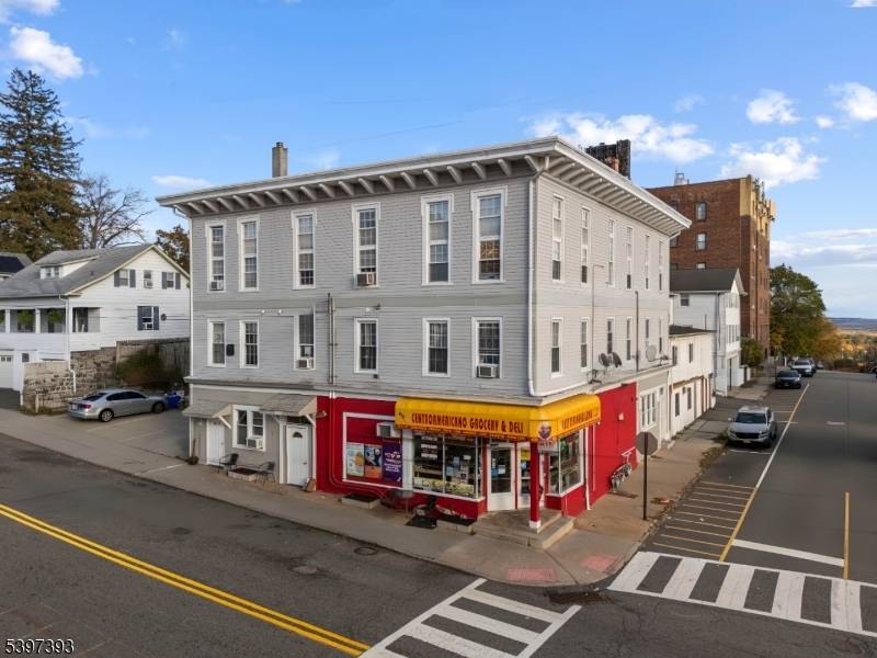 THIS IS A RARE CHANCE TO PURCHASE A WELL KEPT MIXED USE BUILDING THAT HAS BEEN IN THE SAME HANDS FOR NEARLY 3 DECADES !