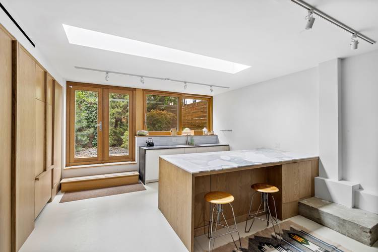 A Modern Masterpiece in East Williamsburg Discover elevated urban living at 44 Sharon Street, a distinguished townhouse residence situated directly across from the lush canopy of Cooper Park.