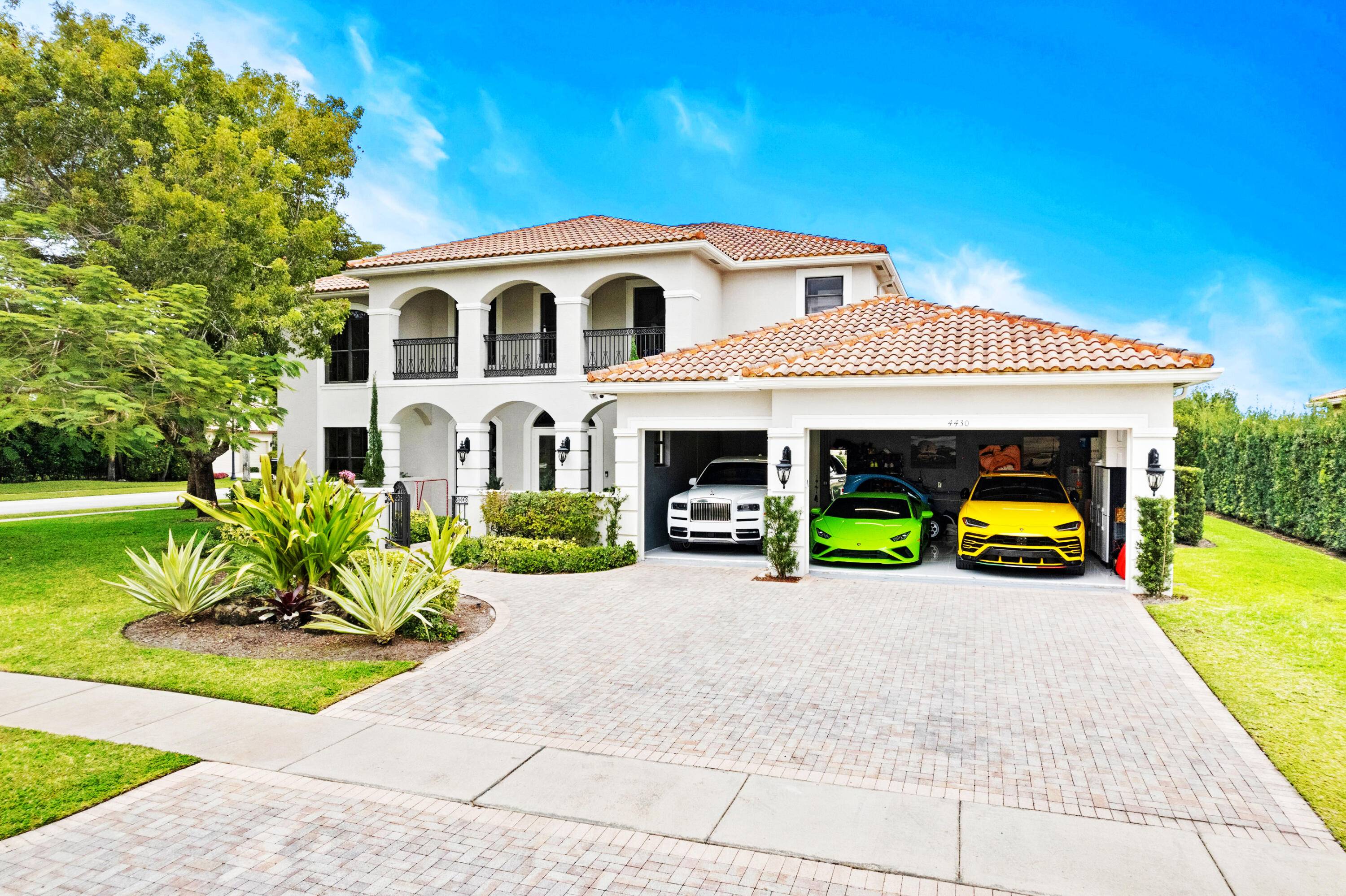 Discover an unparalleled standard of living in this estate home, nestled within the exclusive and gated community of The Estates at Isles At Wellington.