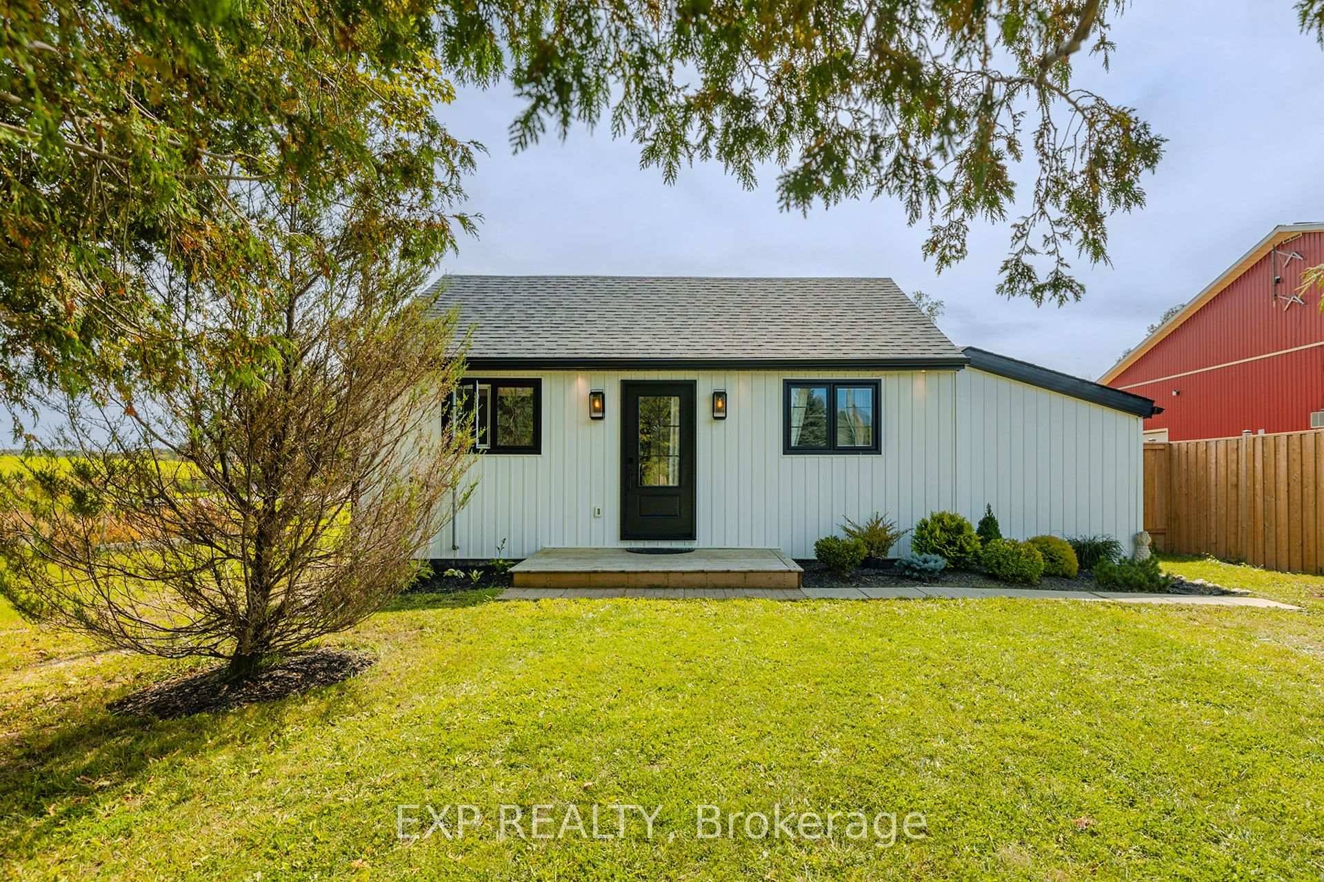Nestled on a generous. 35 acre lot, this beautifully updated bungalow blends country like surroundings with unbeatable convenience.