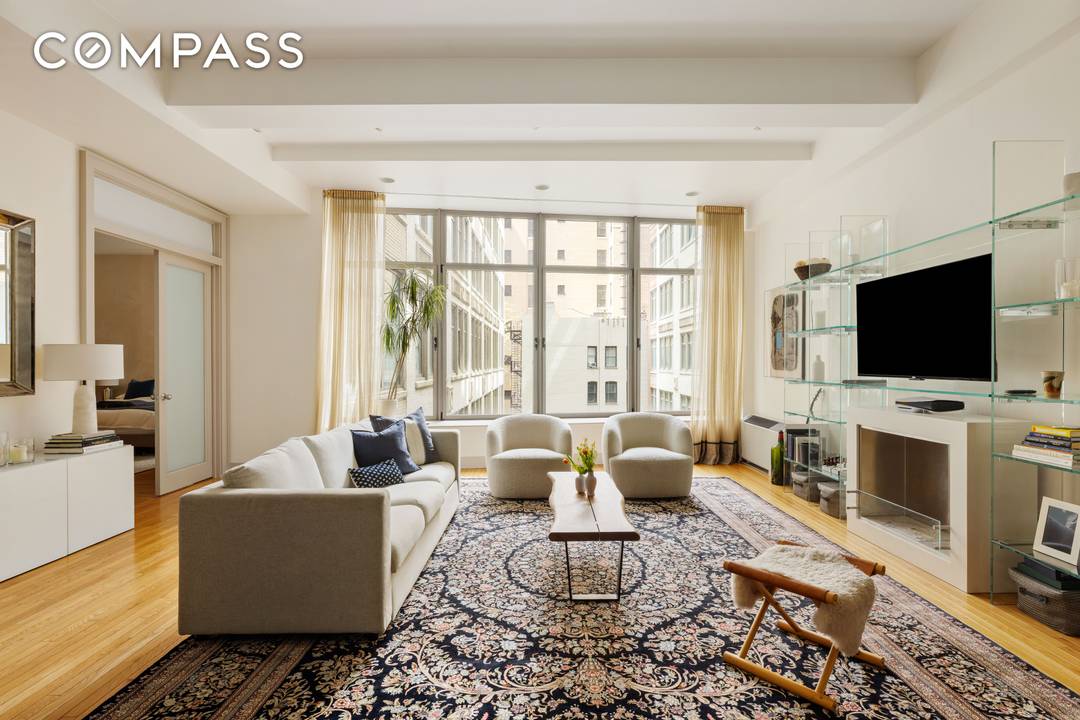 Apartment 5R is a beautifully appointed two bedroom, two bathroom loft with an oversized walk in closet, offering a seamless blend of timeless New York character and refined contemporary design.