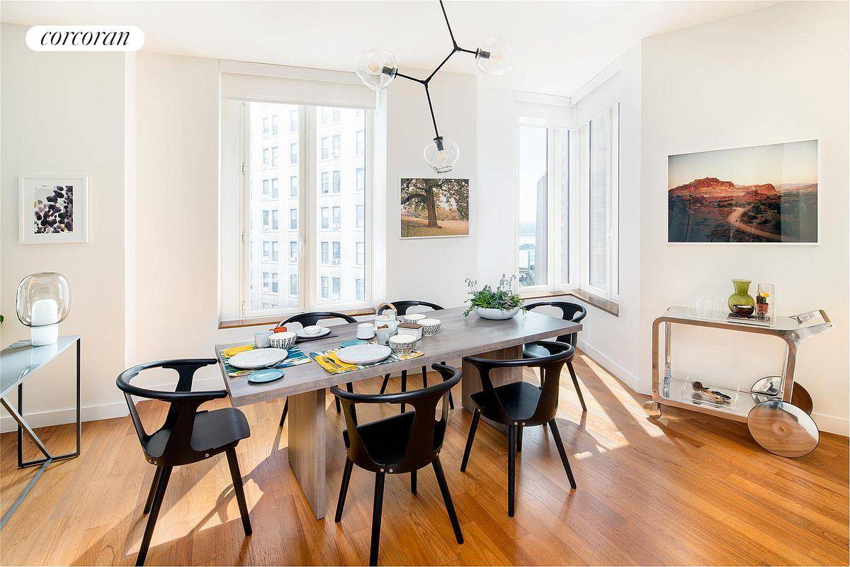 This beautiful two bedroom, two bathroom E line residence is perched on southern point of 15 William, that features spectacular views of downtown New York's iconic architecture and water views ...