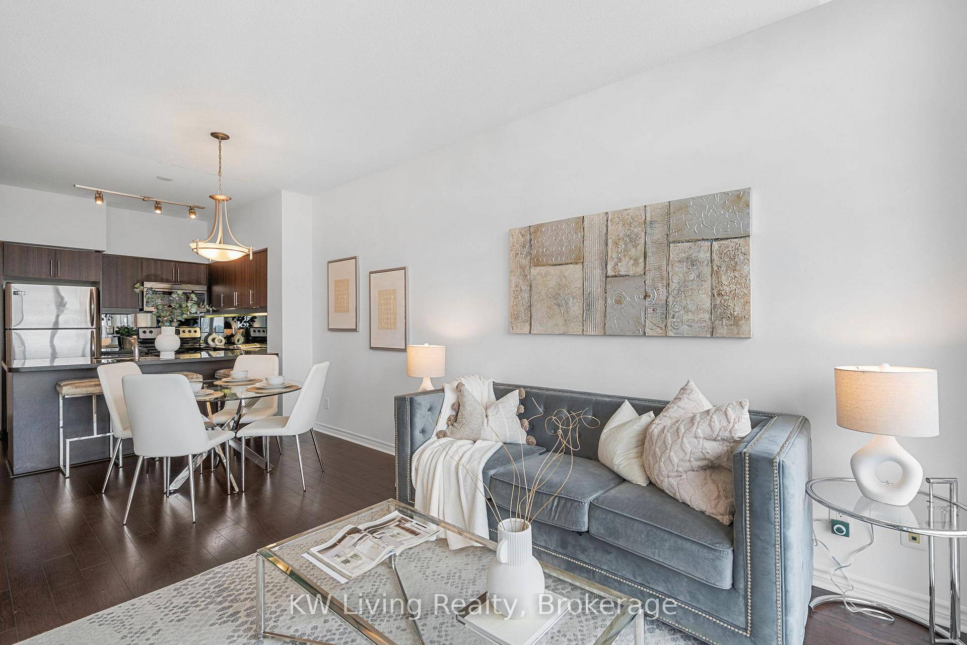 This bright and spacious 1 den suite on the top floor features soaring 9 ft ceilings, rich hardwood floors, and unobstructed west facing views.
