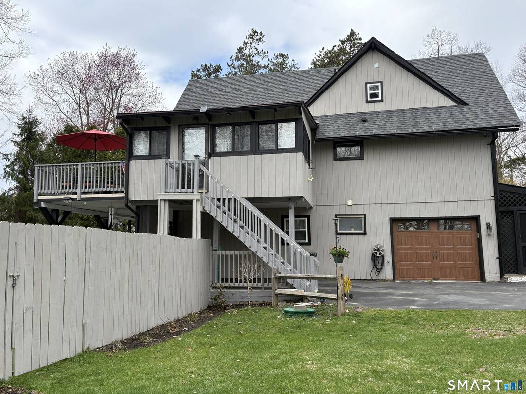 Welcome to this move in ready 2 bedroom, 3 full bathroom home, perfectly situated within walking distance to Candlewood Lake.