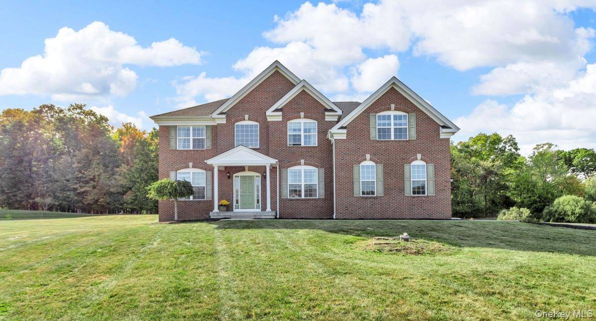 Come view this beautiful brick Majestic Colonial style home situated in a highly sought after neighborhood of Rock Tavern.