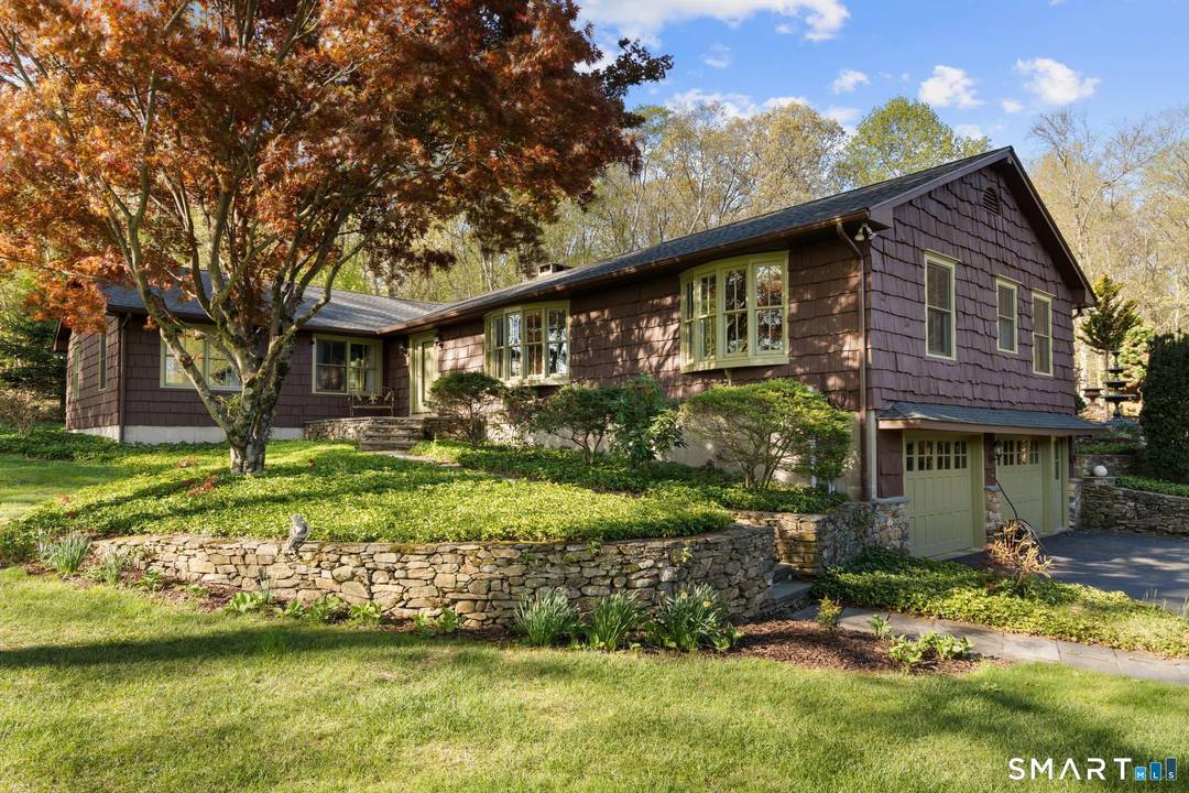 19 Hawley Road sits at the quiet end of a cul de sac off Blueberry Lane, on just over an acre that backs directly to 25.