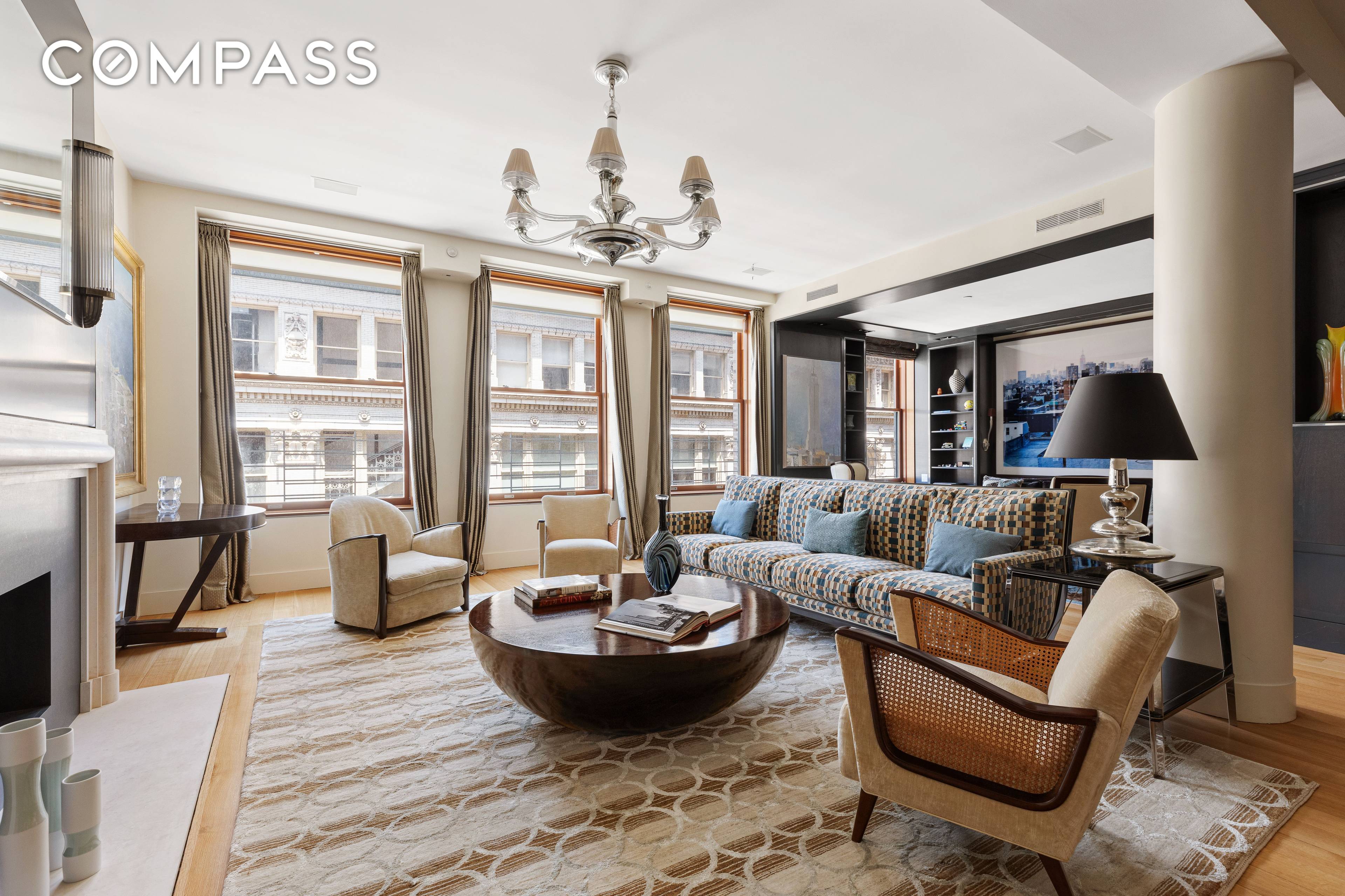 This exquisite triple mint residence enjoys a semi private elevator landing, boasts soaring 11.