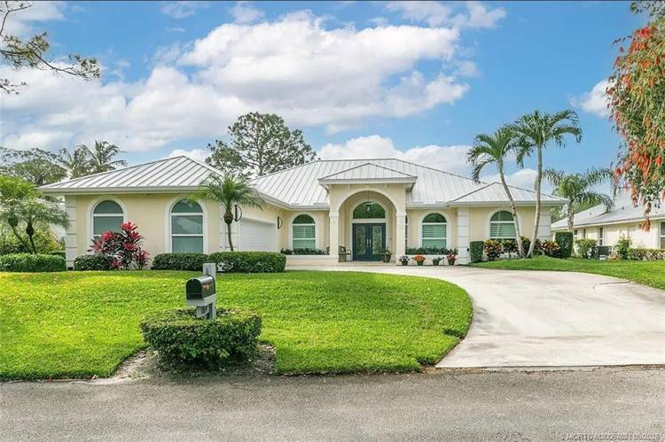 Welcome home to this beautifully maintained 3 bedroom home with a versatile den or optional 4th bedroom in the gated community of River Landing.