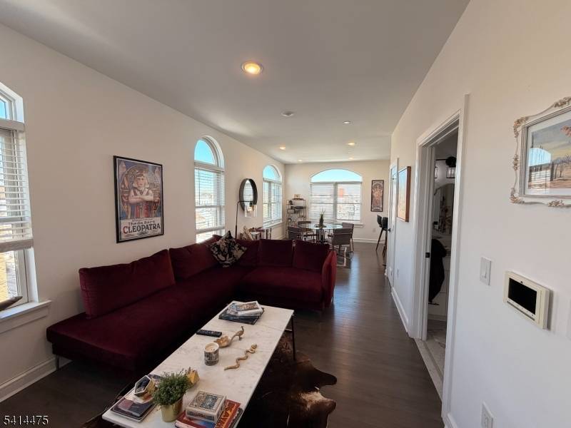 Modern duplex unit with parking and skyline rooftop in the vibrant section of The Heights in Jersey City, this sun drenched duplex residence offers a perfect blend of space, light, ...