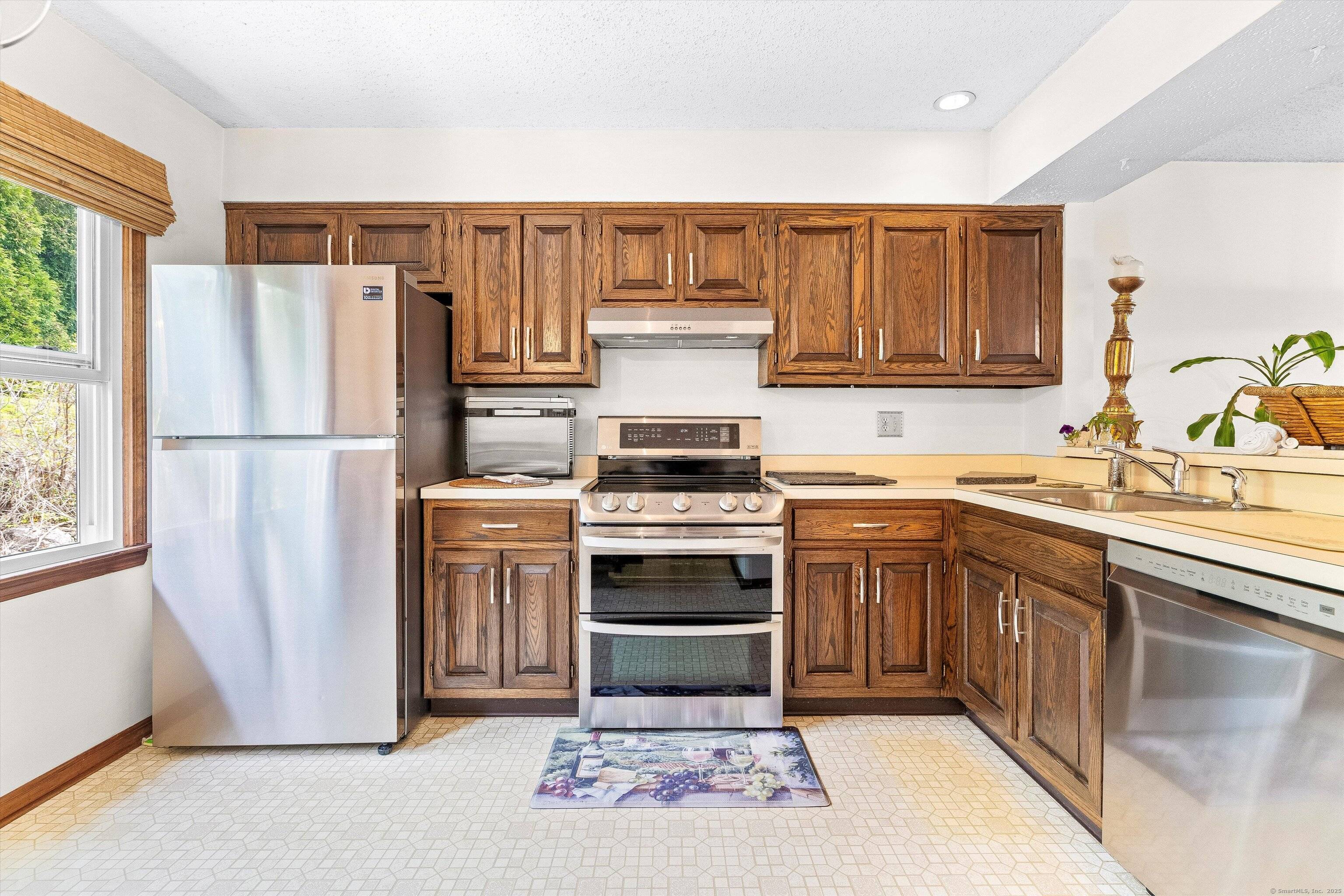 Welcome to 55 Mill Plain Road, a beautifully maintained 2 bedroom, 1.