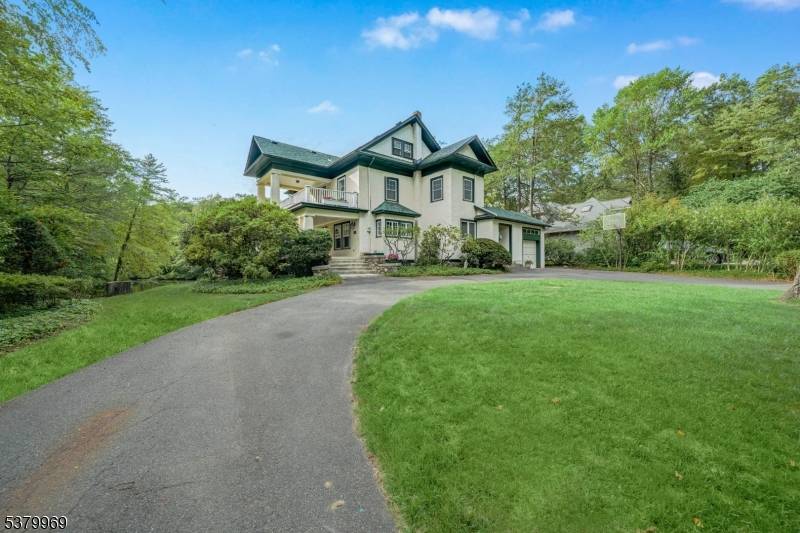 Nestled along the serene shores of Shadow Lake, this stunning 6 bedroom, 3.