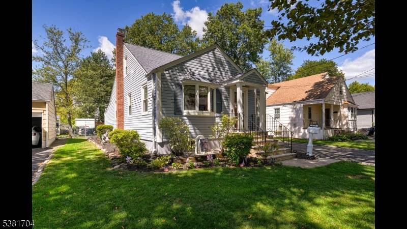 Meticulously Maintained Expanded Cape Cod with 4 Bedrooms, 1.