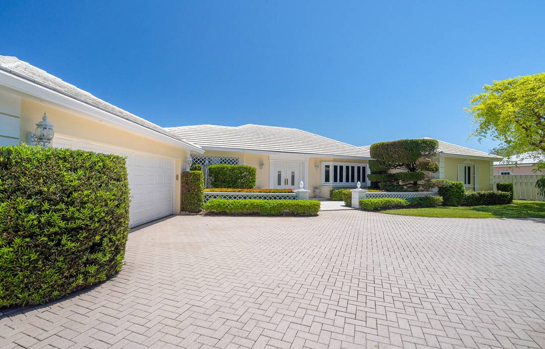 Bermuda inspired charm meets true coastal exclusivity in the gated Village of Sea Ranch Lakes one of Florida's most private, police protected enclaves with its own oceanfront Beach Club.