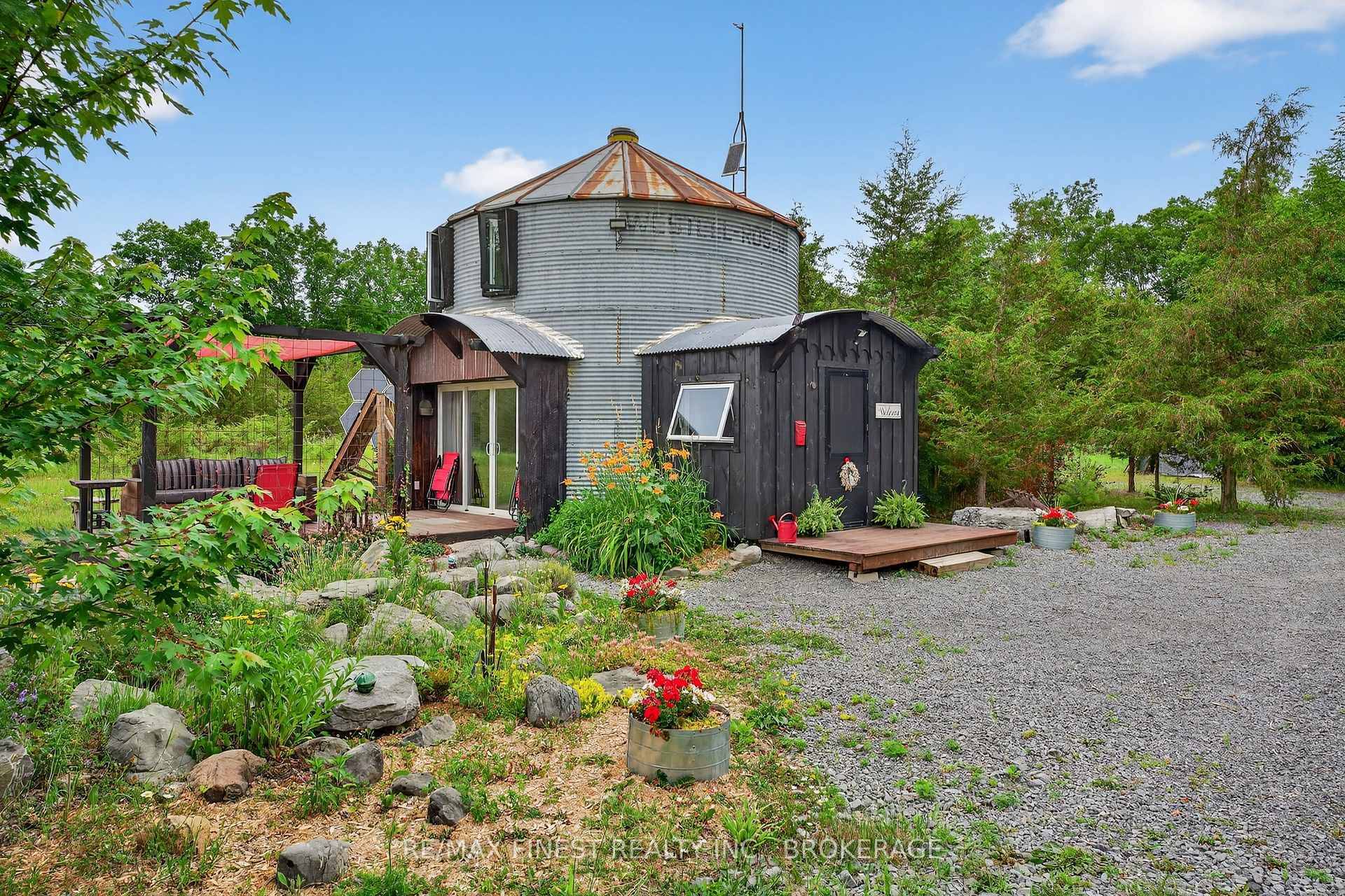 Welcome to a truly unique and sustainable retreat at 922 Lime Lake Road in Roblin, Ontario !