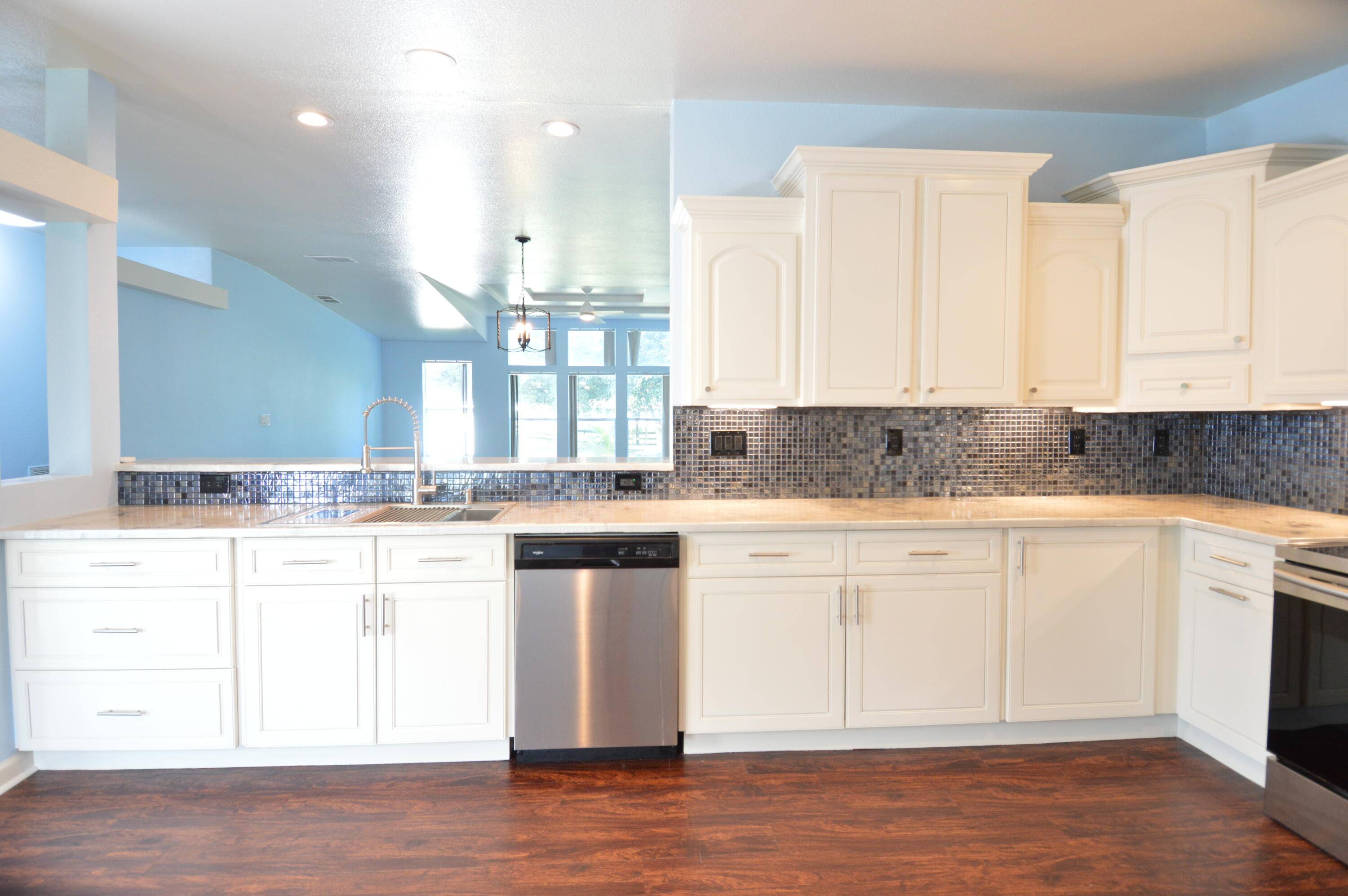 Gorgeously updated 3 bed, 2 bath, plus bonus room on a spacious corner lot just under 1 4 acre !